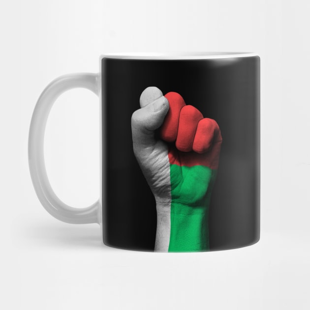 Flag of Madagascar on a Raised Clenched Fist by jeffbartels